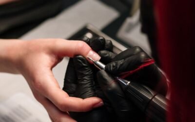 Close-up of a professional manicure session with a focus on nail art and detail.